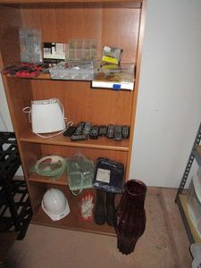 lot 430 image: FURNITURE SLIDERS IN BOX, TOOLS, ORGANIZER BOX, MISC SCREW SETS , REMOTES, SMALL AIR PURIFIER, BOOTS, HARD HAT, GLOVES. WOOD SHELVINGUNIT NOT INCLUDED.&nbsp
