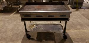 lot 46 image: Radiance 48 Gas Countertop Gridle w 4 Burners on Rolling Stainless Steel Table
