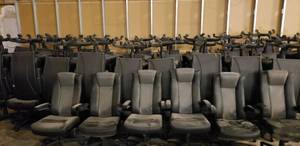 lot 83 image: Lot of 8 Rolling Office Chairs w Retractable Arms.  These are actually really nice chairs