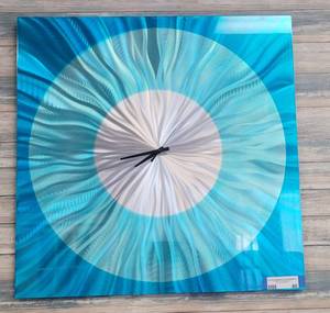 lot 40 image: SQUARED WALL CLOCK IN DESIGN AND COLOR AS SHOWN. APPROX. 24 H x 24 W.