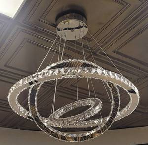 lot 66 image: LARGE MODERN STYLE CHANDELIER IN DESIGN AND COLOR AS SHOWN. APPROX. 27.5 W X 30 H.