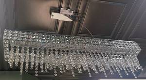 lot 538 image: RECTANGULAR CHANDELIER IN STYLE AND DESIGN AS SHOWN. APPROX. 35.5 L x 7 W x 27 H.