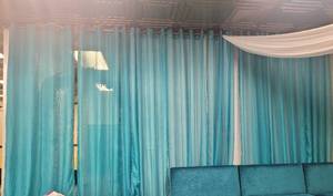 lot 91 image: LOT OF 7 CURTAIN PANELS AND RODS IN STYLE AND COLOR SHOWN. (SOLD 7 X THE MONEY)