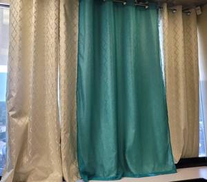 lot 94 image: LOT OF 3 CURTAIN PANELS AND RODS IN STYLE AND COLOR SHOWN. (SOLD 3 X THE MONEY)