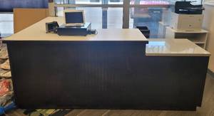 lot 115 image: LARGE 90 X 72.75 X 27 X 36 H L-SHAPE RECEPTION DESK WITH STORAGE AREA IN DESIGN AND COLOR AS SHOWN. CONTENTS NOT INCLUDED