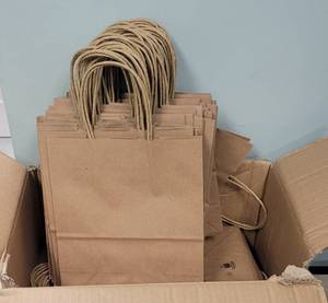 lot 146 image: BOX LOT OF KRAFT PAPER BAGS AS SHOWN. GENEROUS COUNT