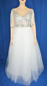 lot 21 image: SEQUINS WEDDING DRESS IN DESIGN AND COLOR AS SHOWN. SIZE 26