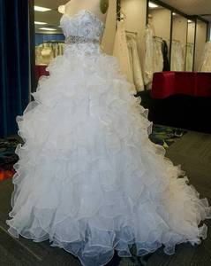 lot 339 image: WEDDING DRESS IN DESIGN AND COLOR AS SHOWN. SIZE 12.