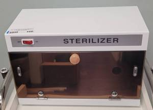lot 160 image: UV STERILIZER CABINET MODEL M-2009 WITH MANUAL AND ACCESSORIES AS SHOWN. CHECK IT OUT