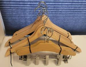 lot 237 image: LOT OF WOODEN CLOTHES HANGERS IN STYLE SHOWN.