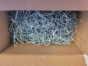 lot 243 image: BOX LOT OF CURTAIN HOOKS AS SHOWN.