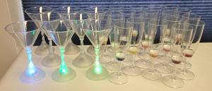 lot 253 image: DECORATIVE CHANPAGNE CUPS AND LED LIGHT UP MARTINI CUPS