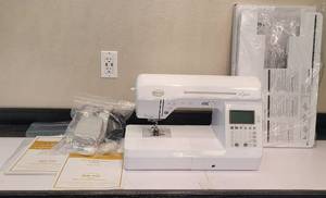 lot 258 image: BABY LOCK LYRIC SEWING MACHINE MODEL BLMLR WITH ACCESSORIES AND A LARGE LOT OF SEWING NOTIONSEXTRAS AS SHOWN. CHECK IT OUT