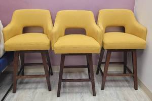 lot 288 image: LOT OF 3 CUSHIONED HIGH STOOLS WITH WOODEN FRAME IN STYLE AND COLOR SHOWN. (SOLD 3 X THE MONEY) EACH APPROX. 22 W x 24 D x 37 H.