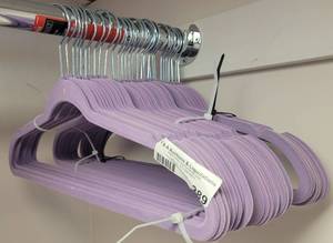 lot 289 image: LOT OF VELVET HANGERS IN COLOR AS SHOWN.