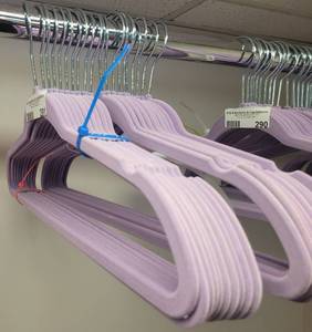 lot 291 image: LOT OF VELVET HANGERS IN COLOR AS SHOWN.
