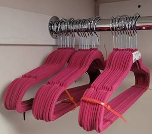 lot 295 image: LOT OF VELVET HANGERS IN COLOR AS SHOWN.