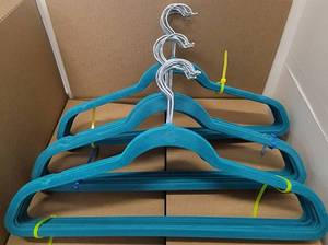 lot 305 image: LOT OF VELVET HANGERS IN COLOR AS SHOWN.