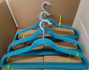 lot 306 image: LOT OF VELVET HANGERS IN COLOR AS SHOWN.