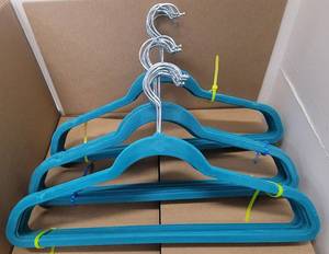 lot 307 image: LOT OF VELVET HANGERS IN COLOR AS SHOWN.