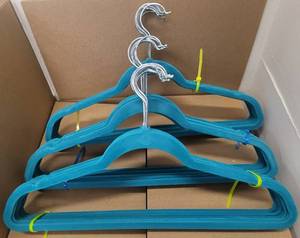 lot 308 image: LOT OF VELVET HANGERS IN COLOR AS SHOWN.