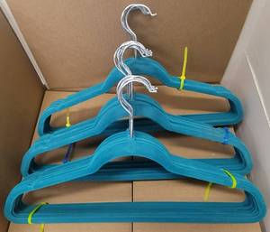 lot 309 image: LOT OF VELVET HANGERS IN COLOR AS SHOWN.