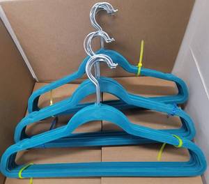 lot 310 image: LOT OF VELVET HANGERS IN COLOR AS SHOWN.