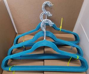lot 311 image: LOT OF VELVET HANGERS IN COLOR AS SHOWN.