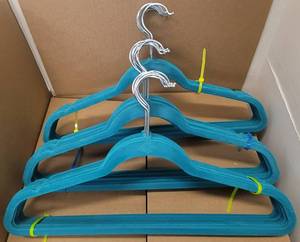 lot 312 image: LOT OF VELVET HANGERS IN COLOR AS SHOWN.
