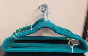 lot 391 image: LOT OF VELVET HANGERS IN COLOR AS SHOWN.