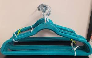 lot 393 image: LOT OF VELVET HANGERS IN COLOR AS SHOWN.