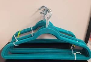 lot 395 image: LOT OF VELVET HANGERS IN COLOR AS SHOWN.