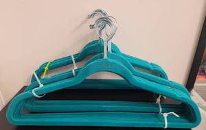 lot 396 image: LOT OF VELVET HANGERS IN COLOR AS SHOWN.