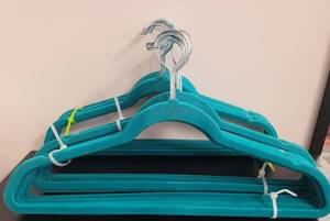 lot 397 image: LOT OF VELVET HANGERS IN COLOR AS SHOWN.
