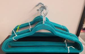 lot 398 image: LOT OF VELVET HANGERS IN COLOR AS SHOWN.