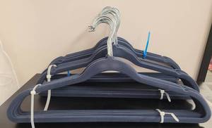 lot 410 image: LOT OF VELVET HANGERS IN COLOR AS SHOWN.