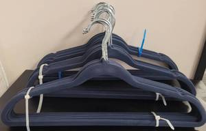 lot 412 image: LOT OF VELVET HANGERS IN COLOR AS SHOWN.