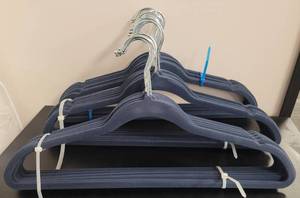 lot 413 image: LOT OF VELVET HANGERS IN COLOR AS SHOWN.