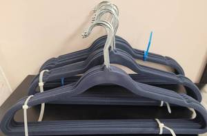 lot 414 image: LOT OF VELVET HANGERS IN COLOR AS SHOWN.