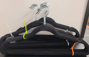 lot 437 image: LOT OF VELVET HANGERS IN COLOR AS SHOWN.
