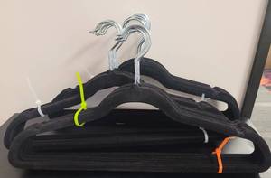lot 438 image: LOT OF VELVET HANGERS IN COLOR AS SHOWN.