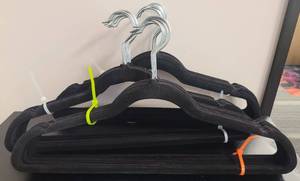 lot 439 image: LOT OF VELVET HANGERS IN COLOR AS SHOWN.