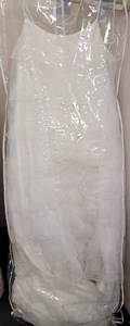 lot 382 image: WEDDING DRESS SKIRT IN DESIGN AND COLOR AS SHOWN.
