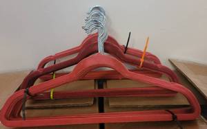 lot 464 image: LOT OF VELVET HANGERS IN COLOR AS SHOWN.