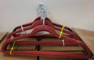 lot 468 image: LOT OF VELVET HANGERS IN COLOR AS SHOWN.