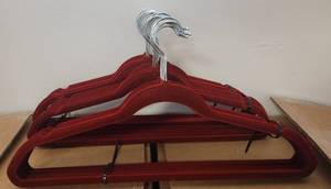 lot 483 image: LOT OF VELVET HANGERS IN COLOR AS SHOWN.
