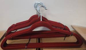 lot 485 image: LOT OF VELVET HANGERS IN COLOR AS SHOWN.