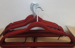 lot 489 image: LOT OF VELVET HANGERS IN COLOR AS SHOWN.