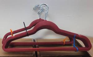 lot 491 image: LOT OF VELVET HANGERS IN COLOR AS SHOWN.
