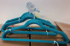 lot 503 image: LOT OF VELVET HANGERS IN COLORS AS SHOWN.